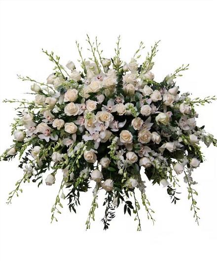 Photo of flowers: White Serenity Casket Spray